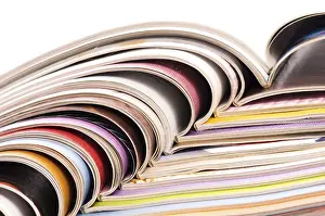 Environmental Conservation Photography Impressions: Stack of open magazines