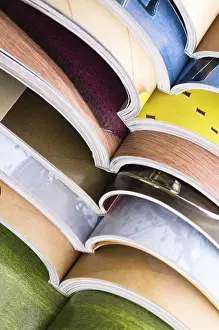 Deserted Library Impressions: Stack of open magazines