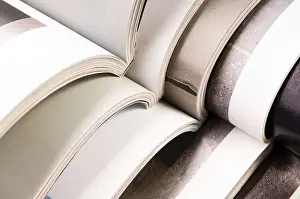 Deserted Library Interior Impressions: Stack of open magazines