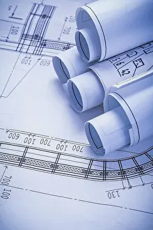 Rolled Up Papers Impressions: Stack of rolls blueprints close up