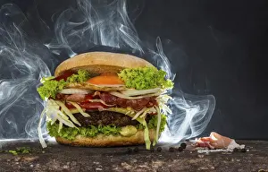Fattening Foods Impressions: Steaming cheeseburger