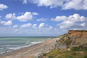 Cliff Line Landscape Photo Impressions: Steep cliffs and sandy beach with dramatic clouds in Ambleteuse