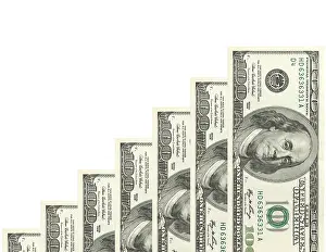 Studio Shot Currency Impressions: Steps made of dollars on white background