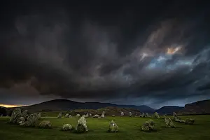 Dramatic Cloudy Skies Europe Impressions: Stone circle with dramatic dark cloud sky