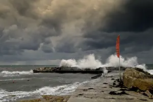 Steep Cliff Waterfront View Impressions: Storm