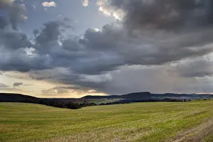 Stormy Atmosphere Impressions: Storm clouds over fields