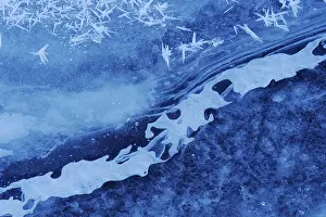 Winter Nature Scene Impressions: Structures in an iced up course of a stream