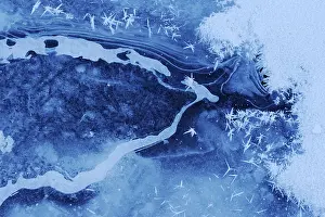 Winter Nature Scene Impressions: Structures in an iced up course of a stream