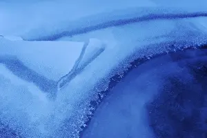 Winter Nature Scene Impressions: Structures in an iced up course of a stream