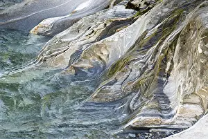 Striped Rock Formations Impressions: Structures in the river Vezasca