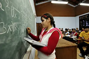 Youth Education Impressions: Student solving a math equation
