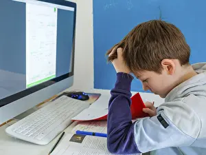 Childhood Education Impressions: Students doing homework in front of the computer