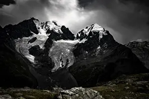 Grisons Mountain Range Impressions: Summit of the Bernina Group with dramatic clouds
