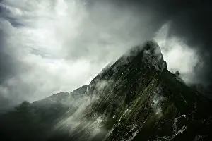 Central Europe Mountain Peaks Impressions: Summit ridge with dramatic clouds
