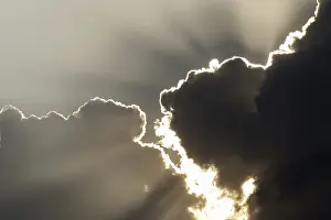 Stormy Weather Impressions: Sun behind storm clouds