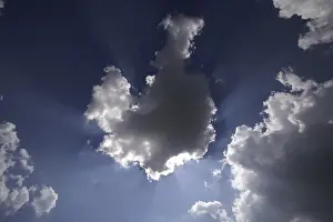 Cloudy Atmosphere Impressions: Sun behind white clouds