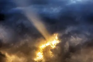 Scottish Travel Photography Impressions: Sunbeam through gap in clouds, dramatic evening sky