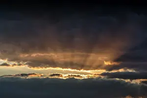 Swedish Evening Sky Impressions: Sunbeams behind clouds, dramatic evening sky