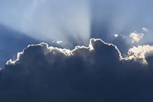 Light Beam Photography Impressions: Sunrays behind a cloud, Germany