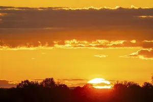 Cloudy Skies Central Europe Impressions: Sunrise, sky and clouds orange, Thuringia, Germany