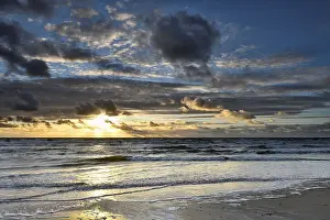 Sunset On The North Sea Impressions: Sunset with clouds on the beach
