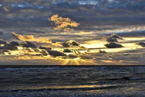 Sunset On The North Sea Impressions: Sunset with clouds on the beach