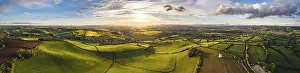 Drone Shot Of Devon Fields Impressions: Sunset over Devon Windmill from a drone