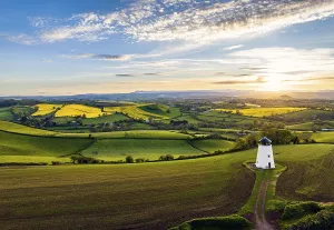Evening Light Landscape Photo Impressions: Sunset over Devon Windmill from a drone