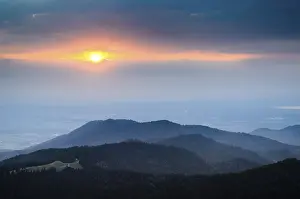 Bavarian Alps Sunset Impressions: Sunset between layers of clouds