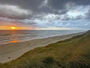 Evening Sky Over The Sea Impressions: Sunset over the sea under a dramatic