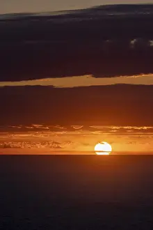 Cloudy Evening Sky Europe Impressions: Sunset over the sea, with dramatic clouds