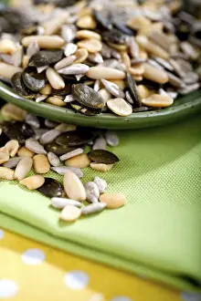 Deserted Countryside Scene Impressions: A table with several nuts and kernels