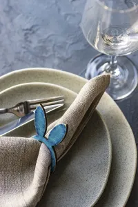 Text Free Space For Copy Impressions: Table setting for festive Easter dinner on rustic background with copy space