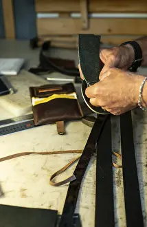 Handicraft Goods Impressions: Tailor process leather in workshop