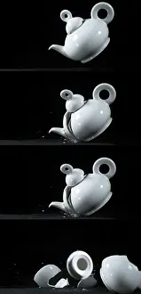 Dark Background Images Impressions: Tea-Pot falling and exploding on Black Background