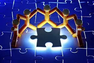Teamwork Concept Impressions: Team work on solving puzzle problem