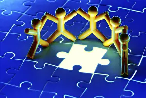 Teamwork Concept Impressions: Team work on solving puzzle problem