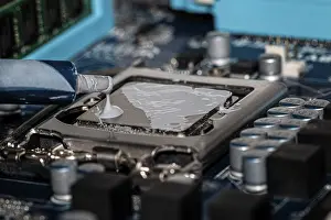 Personal Computer Electronics Impressions: Thermal paste is applied to a processor