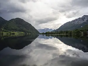 Styria Austria Travel Photography Impressions: Thunderclouds are reflected in the lake