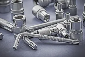 Power Supply Equipment Impressions: Torx and hexkeys on gray background