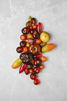 Colorful Vegetables Impressions: Vertical composition with various types of tomatoes