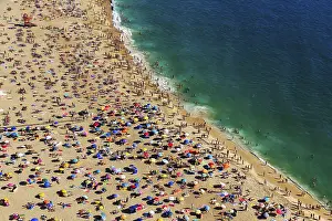 Colourful Parasols Impressions: View from above of anonymous crowd
