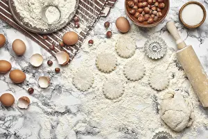 Marble Table Background Impressions: Top view of a kitchenware and baking ingredients on a marble table background