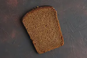Breakfast Meal Idea Impressions: Top view of piece of broun bread
