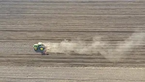 Field Work And Cultivation Impressions: Above view of tractor as pulling machine