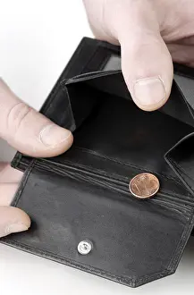 Bankruptcy Symbol Impressions: Wallet opened to show last cent
