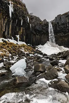 Waterfall In Winter Impressions: Waterfall, stream, basalt columns