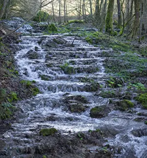 Uninhabited Brook Scenery Impressions: Waterfall of a stream in spring