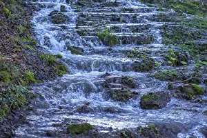 Central Europe Springtime Scenes Impressions: Waterfall of a stream in spring