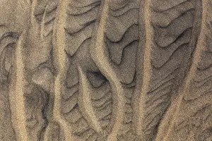 Playa Del Ingles Spain Impressions: Wave pattern, structures in the sand on the sandy beach